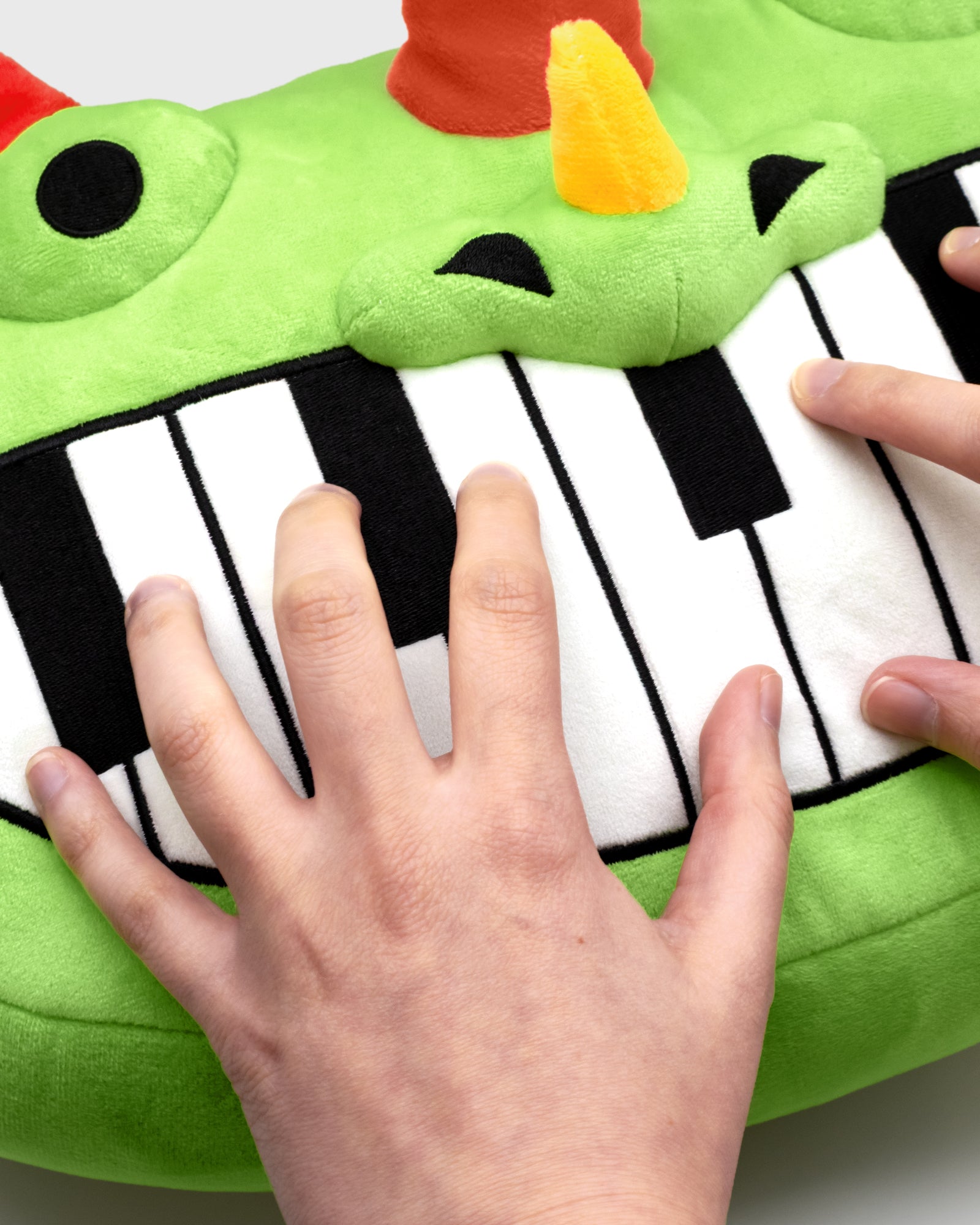 Interactive Pianosaurus Plush Pillow (Pre-Order)